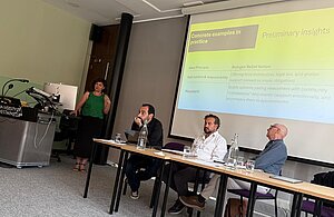 Öykü presenting research in London.